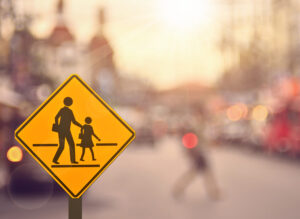 02_ind_AdobeStock_99093179 A crosswalk sign