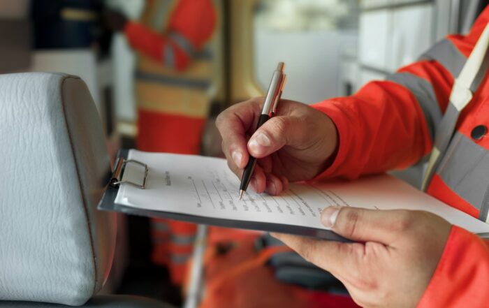 sided-view-hand-filling-document