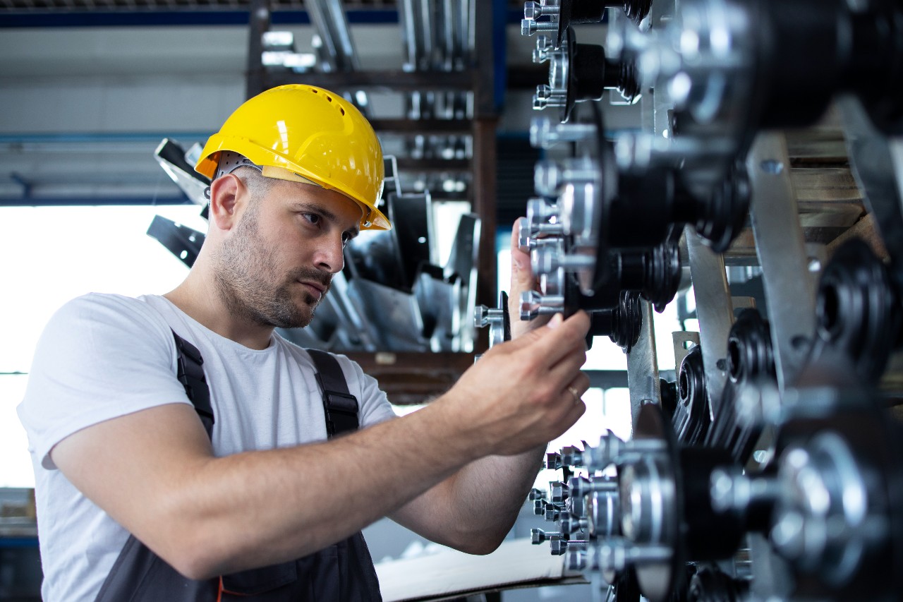industrial-worker-doing-equipment-maintenance